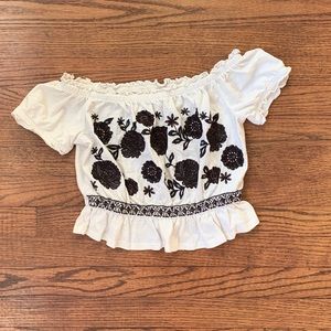 White crop top with black embroidered flowers